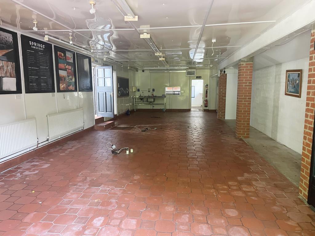 Lot: 8 - FREEHOLD COMMERCIAL OPPORTUNITY WITH POTENTIAL IN FAVOURED SOUTH DOWNS LOCATION - Front retail unit with access from road